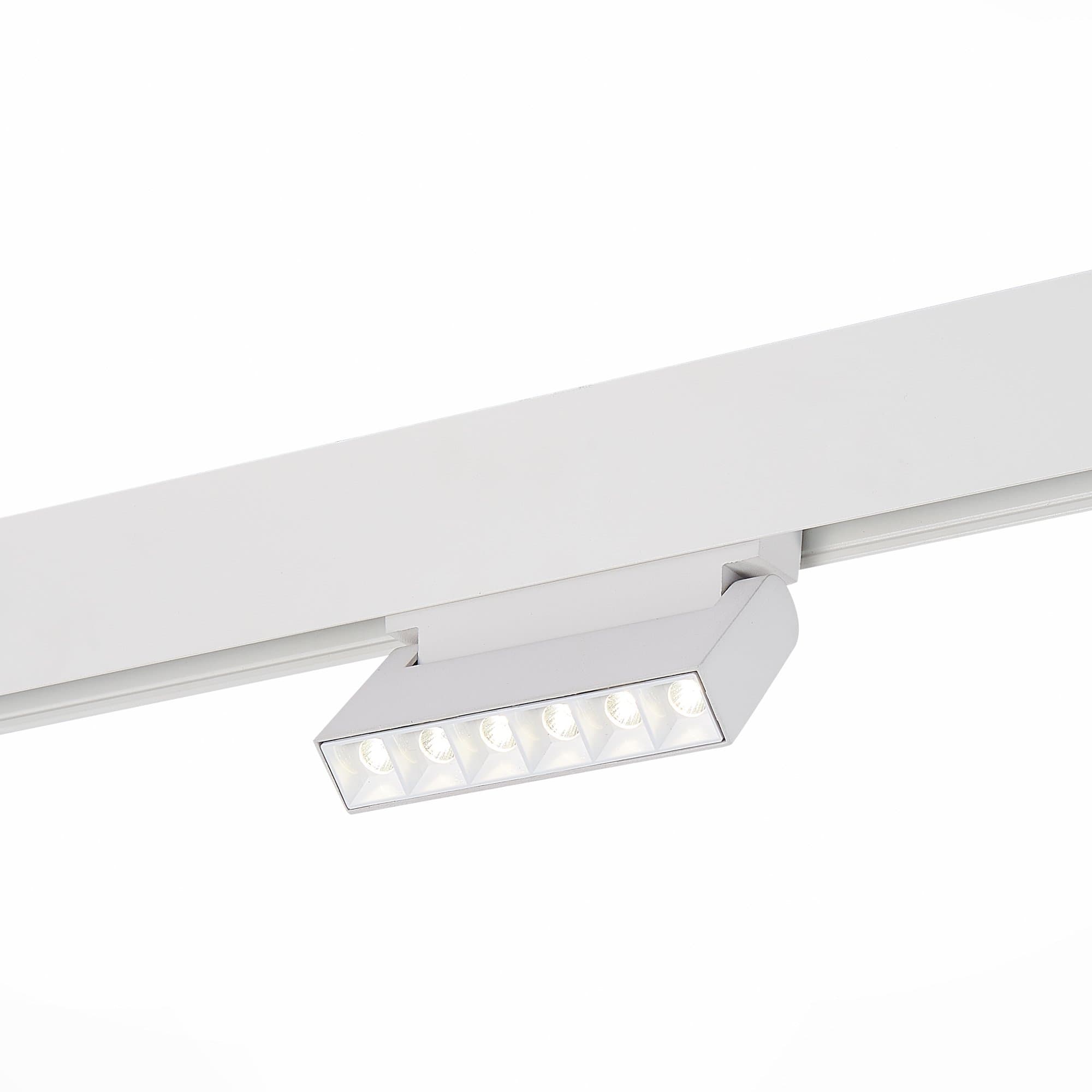 ST Luce ST364.546.06 Магнитный трековый светильник белый LED 1*6W 4000K 532Lm Ra>80 36° IP20 L120xW22xH108 48V